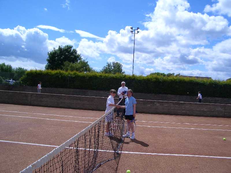 CIMG2517.JPG - The girls shake hands at the end of the match